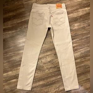 Levi’s 502 in beige denim 32x34. Lightly used.